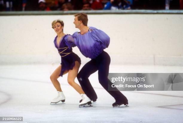 Figure skaters Jayne Torvill and Christopher Dean of the United Kingdom competes in the pairs competition in the 1984 Winter Olympics at Zetra...