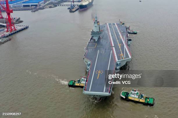 The CNS Fujian, China's third aircraft carrier, begins its maiden sea trial on May 1, 2024 in Shanghai, China. The CNS Fujian, one of the most...