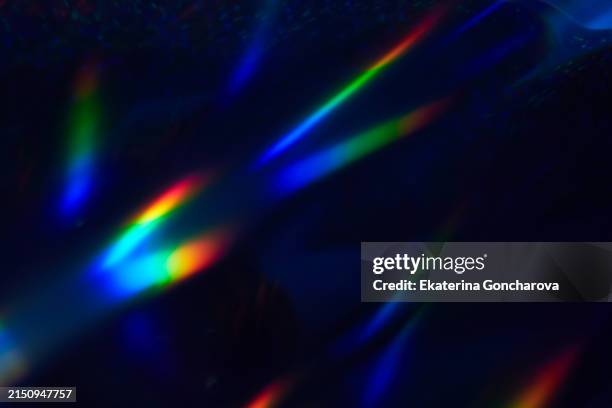 beautiful colorfull holiday background with glitter and blurred and focal lights for new year, christmas or birthday. - spettro luminoso foto e immagini stock