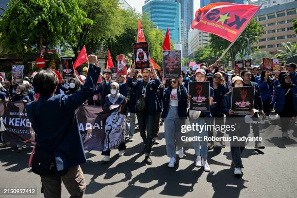 Indonesian students march down the street during May Day rally on May 01, 2024 in Surabaya, Indonesia. People across Indonesia have organize rallies...
