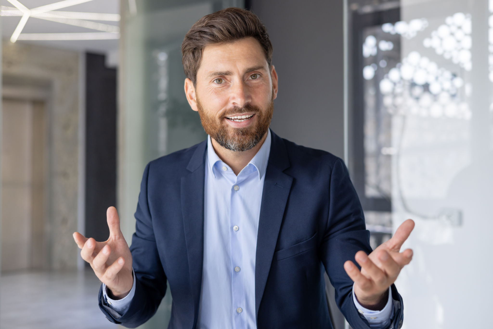Businessman engaging in a video call with focused expression Businessman engaging in a video call with focused expression