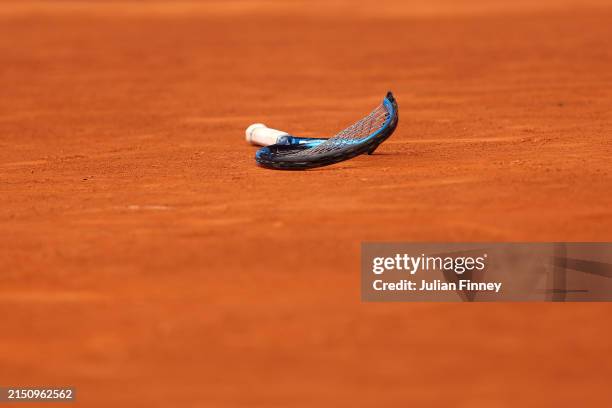 Broken racket from runner up Yulia Putintseva of Kazakhstan is seen on the clay court after the Women’s Singles quarter-final match on Day Nine of...