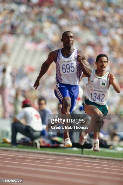British track and field athlete Linford Christie of the Great Britain team competes in qualifying heat 3 of the Men's 100 metres event at the 1992...