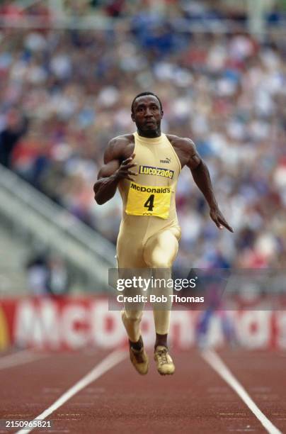 British athlete Linford Christie competes to win the Men's 100 metres event on the track at the McDonald's Games in the Don Valley Stadium in...