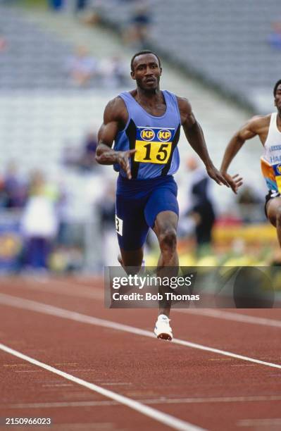 British athlete Linford Christie competes in the Men's 100 metres sprint event on the track at the 1994 AAA Championships at the Don Valley Stadium...