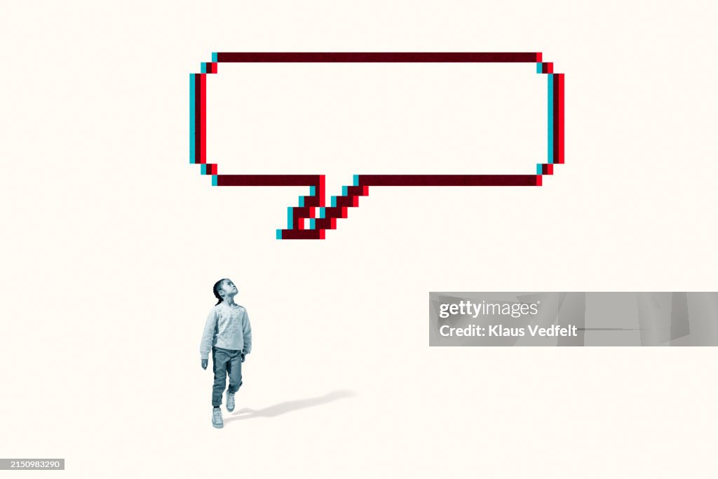 Girl looking at large speech bubble