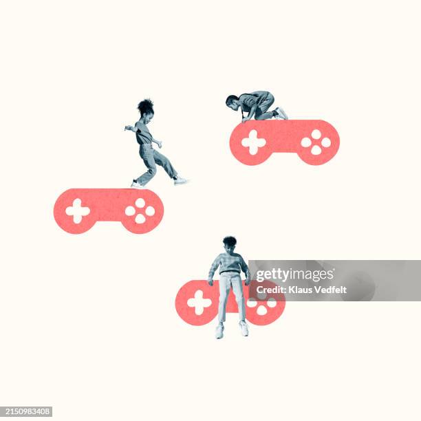 friends playing on coral gaming joysticks - joystick stock pictures, royalty-free photos & images