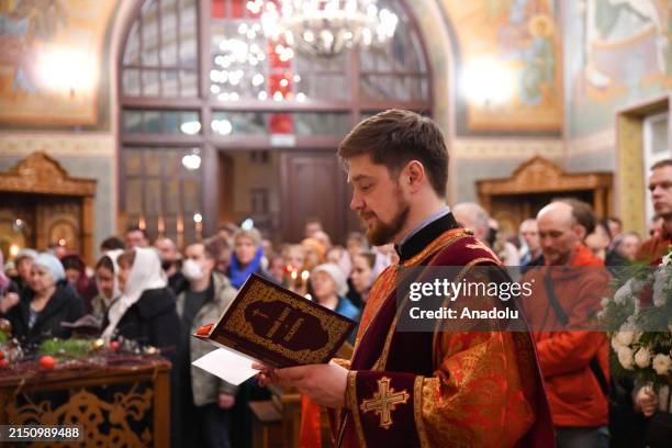 Orthodox Christians gather at the Church of St John the Baptist in Krasnoyarsk, Russia on May 04, 2024.The Easter Midnight service holds deep...