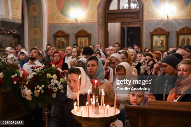 Orthodox Christians gather at the Church of St John the Baptist in Krasnoyarsk, Russia on May 04, 2024.The Easter Midnight service holds deep...