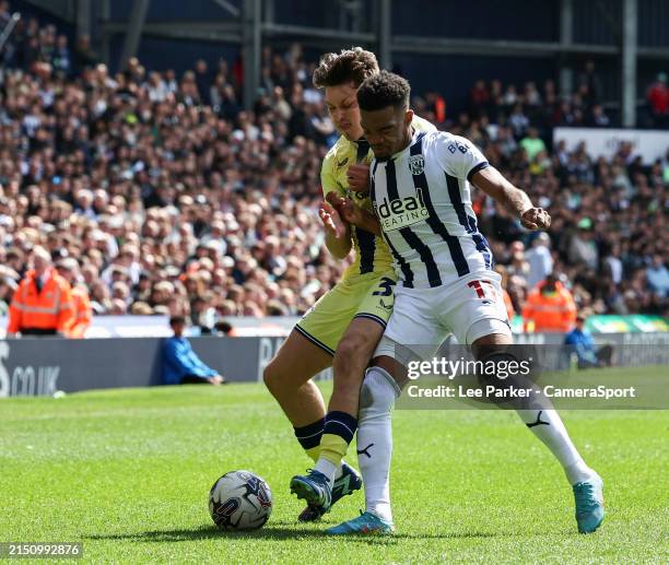 Preston North End's Josh Seary is tackled by West Bromwich Albion's Grady Diangana during the Sky Bet Championship match between West Bromwich Albion...