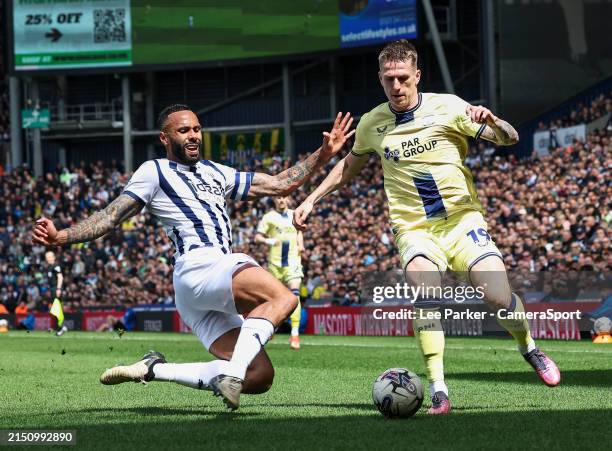 Preston North End's Emil Riis Jakobsen is tackled by West Bromwich Albion's Kyle Bartley during the Sky Bet Championship match between West Bromwich...
