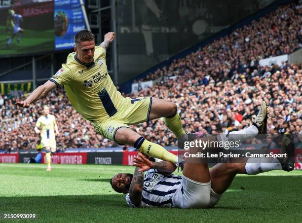 Preston North End's Emil Riis Jakobsen is tackled by West Bromwich Albion's Kyle Bartley during the Sky Bet Championship match between West Bromwich...