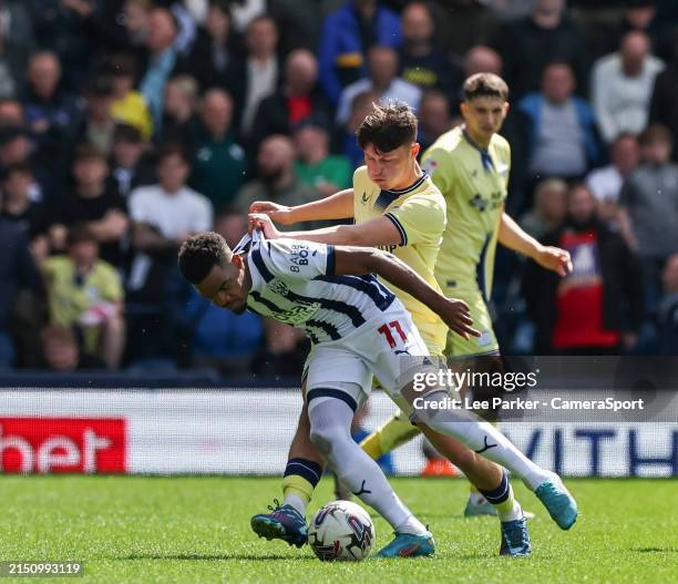West Bromwich Albion's Grady Diangana is tackled by Preston North End's Josh Seary during the Sky Bet Championship match between West Bromwich Albion...