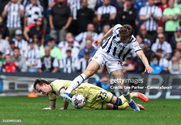 Preston North End's Liam Millar is tackled by West Bromwich Albion's Tom Fellows during the Sky Bet Championship match between West Bromwich Albion...