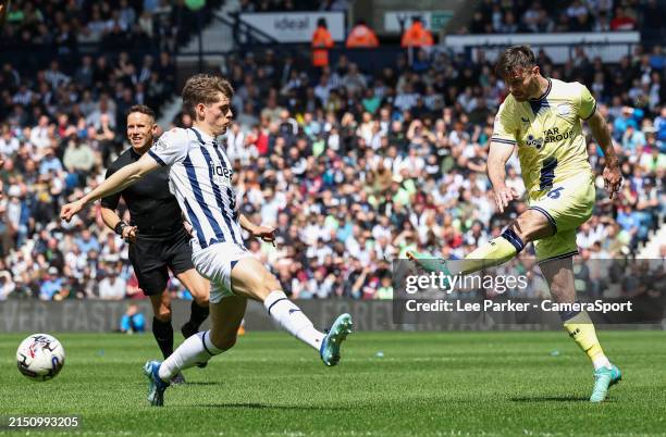 Preston North End's Andrew Hughes shoots for goal despite the attentions of West Bromwich Albion's Tom Fellows during the Sky Bet Championship match...