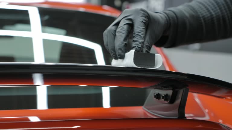 https://media.gettyimages.com/id/2150996808/video/worker-applying-ceramic-coating-on-car-close-up-slow-motion.jpg?b=1&s=640x640&k=20&c=_DV4rR3vFMjPQ-IHx5WBHUVujGQ4YCVt-3PEp6DRoxQ=