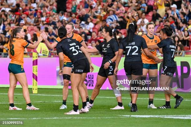 New Zealand's captain Risi Pouri-Lane greets teammates and Australian players after the women's Cup final between New Zealand and Australia at the...