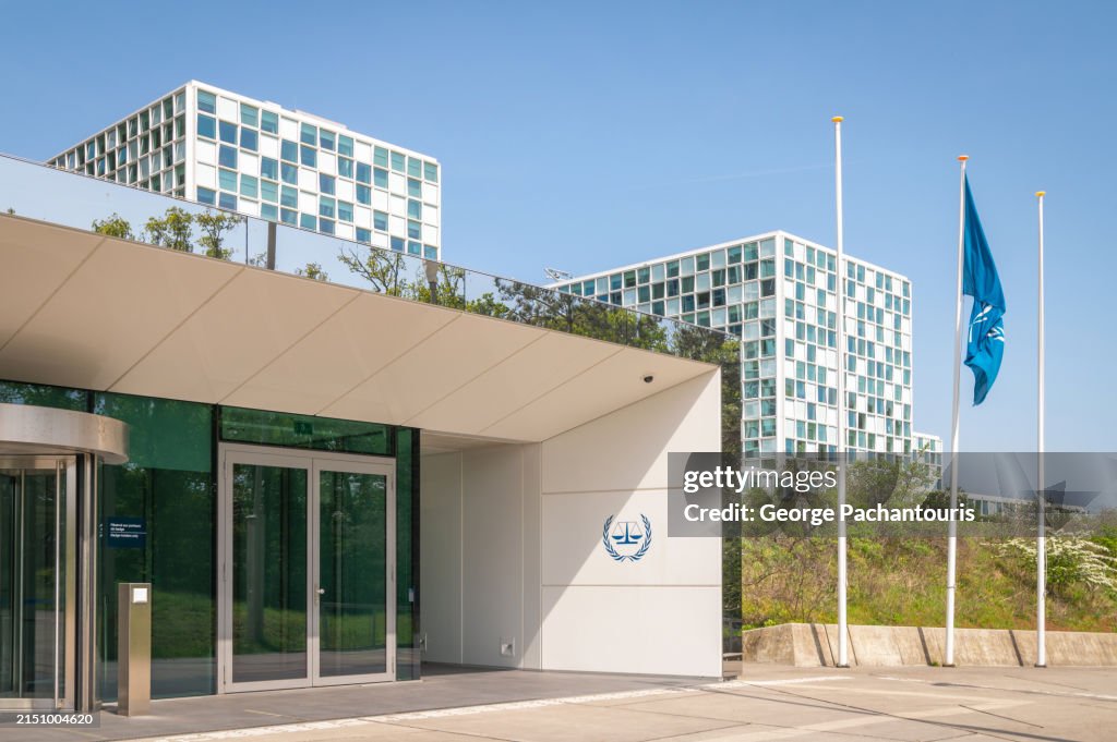 Entrance and flag of ICC (International Criminal Court) in the Hague, Netherlands