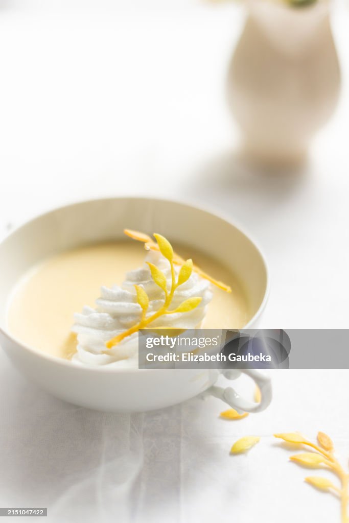Iles Flottantes with yellow beetroot tuille