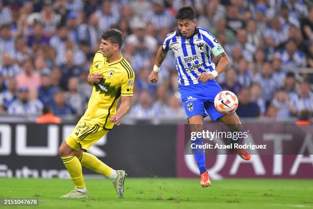 Maximiliano Meza of Monterrey fights for the ball with Yevhen Cheberko of Columbus Crew during the 2024 Concacaf Champions Cup semifinal second-leg...