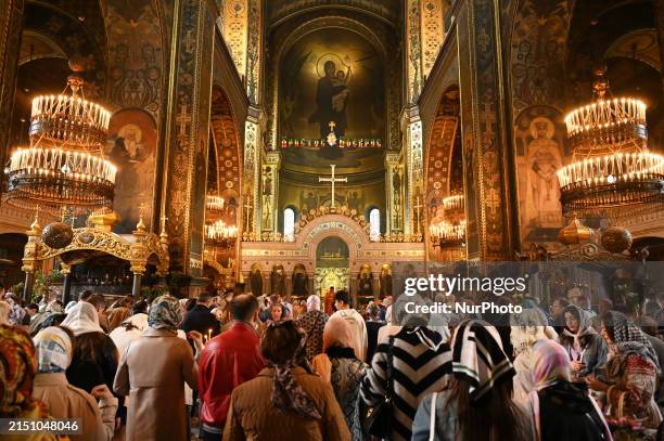 Ukrainian believers are attending an Orthodox Easter mass at St. Volodymyr Cathedral in Kyiv, Ukraine, on May 5 amid the Russian invasion of Ukraine....
