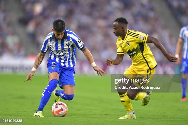Maximiliano Meza of Monterrey dribbles the ball against Yaw Yeboah of Columbus Crew during the 2024 Concacaf Champions Cup semifinal second-leg match...