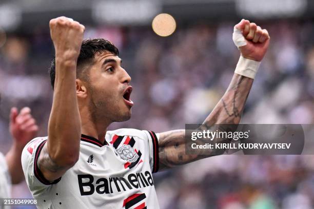 Bayer Leverkusen's Argentine midfielder Exequiel Palacios celebrates scoring the third goal during the German first division Bundesliga football...