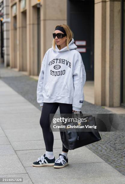 Sonia Lyson is seen wearing black Adidas campus sneaker, leggings Lululemon, Hermes birkin bag, Worst Behavior hoodie, YSL sunglasses, headband on...