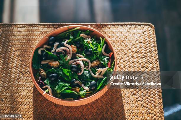salad with seafood and vegetables on wooden table - yam plant stock pictures, royalty-free photos & images