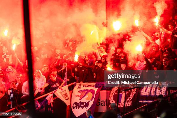 Norrkoping supporters with flares during an Allsvenskan match between AIK and IFK Norrköping at Friends arena on May 5, 2024 in Solna, Sweden.