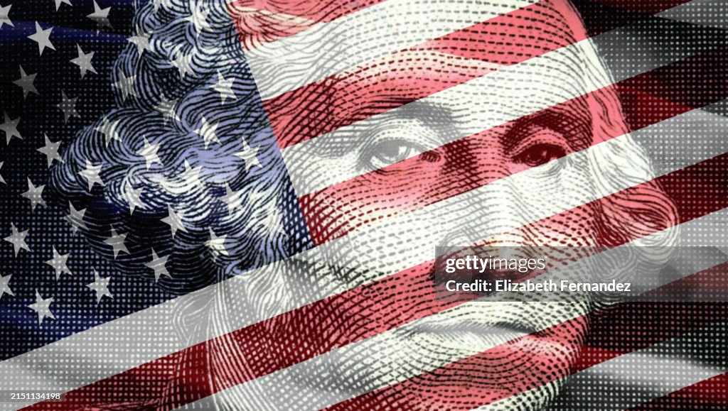 George Washington's portrait on the one-dollar bill alongside the US flag
