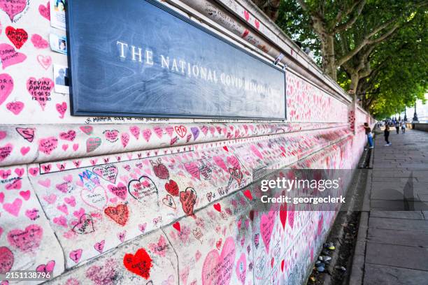 the national covid memorial wall in london - covid memorial stock pictures, royalty-free photos & images