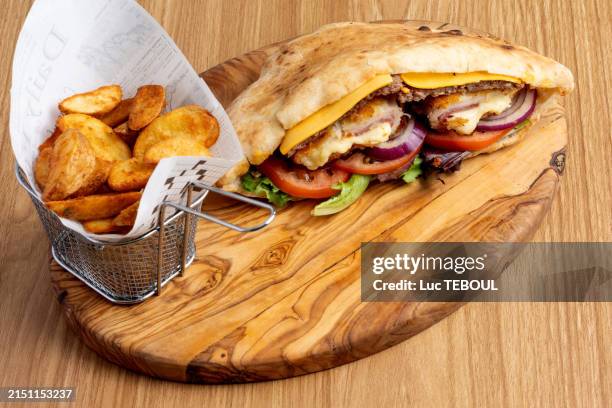 cordon bleu and potato sandwich - chicken cordon bleu sandwich stock pictures, royalty-free photos & images