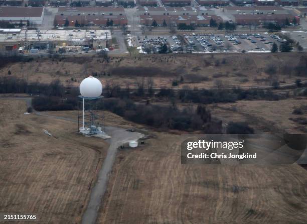 looking down on doppler radar station near industrial park - weather radar stock pictures, royalty-free photos & images