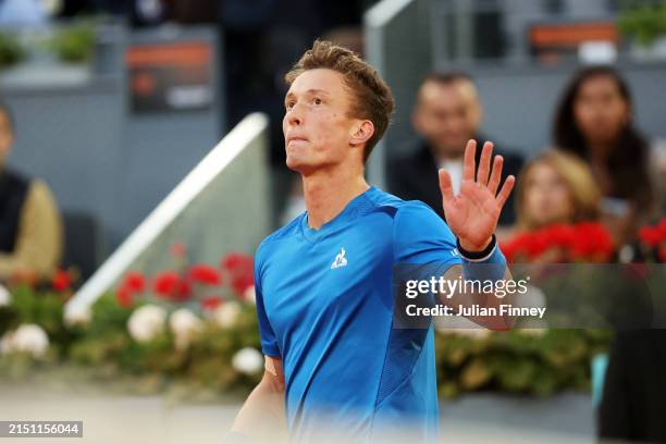 Jiri Lehecka of Czechia acknowledges the crowd following his victory due to Daniil Medvedev's injury retirement during the Men's Singles...