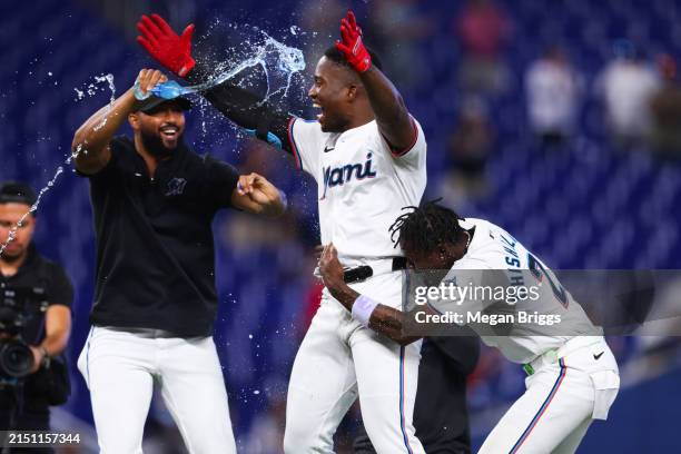 Jesús Sánchez of the Miami Marlins celebrates with teammates after walking it off to defeat the Colorado Rockies at loanDepot park on May 02, 2024 in...