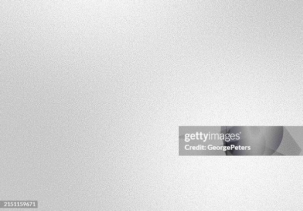 soft, spot lit grainy background - silver texture stock illustrations