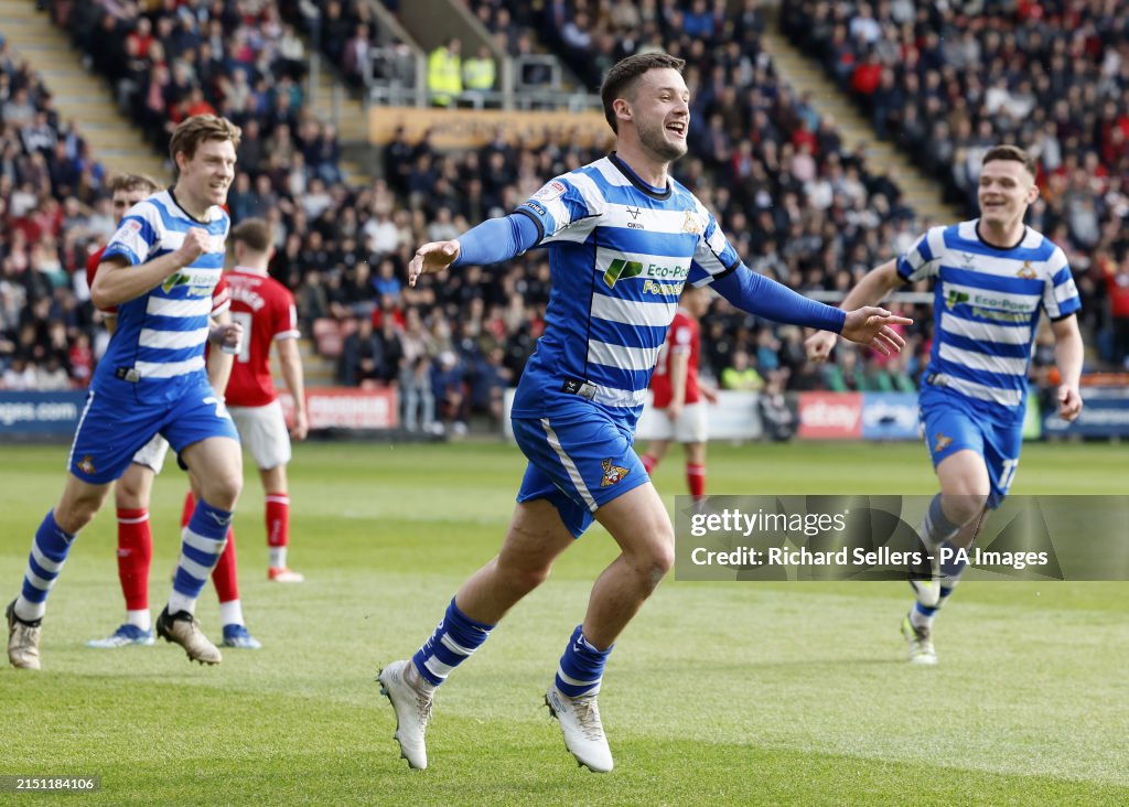 Doncaster Rovers Luke Molyneux celebrates after he scores the opening Doncaster Rovers Luke Molyneux celebrates after he scores the opening