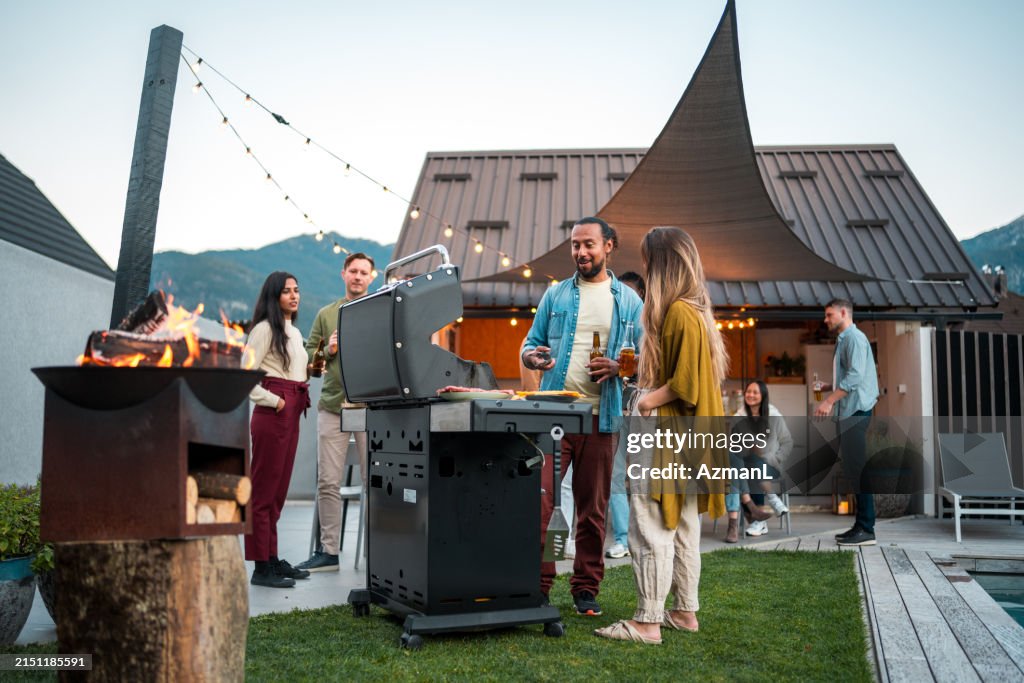 Outdoor Diverse Group Celebration with BBQ Grill