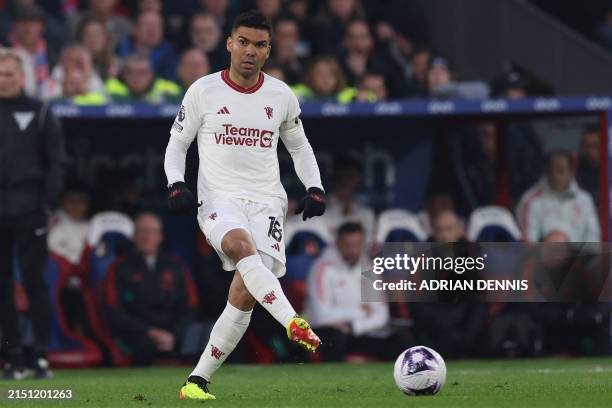 Manchester United's Brazilian midfielder Casemiro passes the ball during the English Premier League football match between Crystal Palace and...