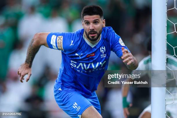Aleksander Mitrovic of Al Hilal celebrates after scoring the 1st goal during the Saudi Pro League match between Al-Ahli SFC and Al-Hilal at King...