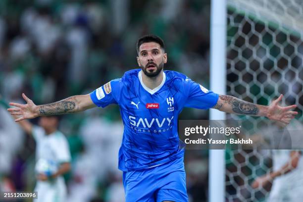 Aleksander Mitrovic of Al Hilal celebrates after scoring the 1st goal during the Saudi Pro League match between Al-Ahli SFC and Al-Hilal at King...