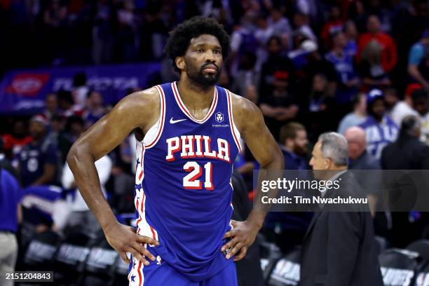 Joel Embiid of the Philadelphia 76ers reacts after his team's 118-115 loss against the New York Knicks in game six of the Eastern Conference First...