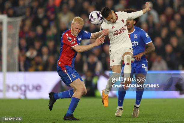 Crystal Palace's English midfielder Will Hughes vies with Manchester United's Brazilian midfielder Antony during the English Premier League football...