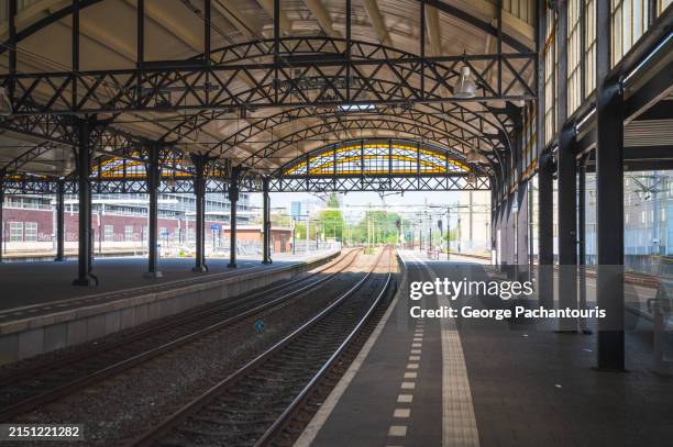 railway platform of an old station - railway station platform stock pictures, royalty-free photos & images