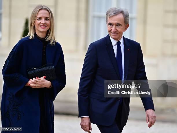 Dior CEO Delphine Arnault and her father LVMH CEO Bernard Arnault arrive to attend an official state dinner as part of the Chinese president's...