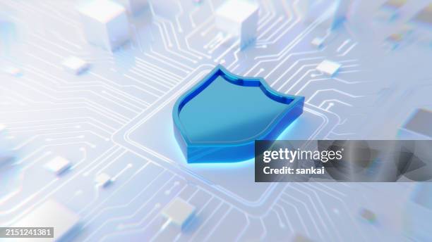 digital security and safety concept. blue glossy shield icon on abstract circuit board with zoom in and lens distortion effect - beveiligingssysteem stockfoto's en -beelden