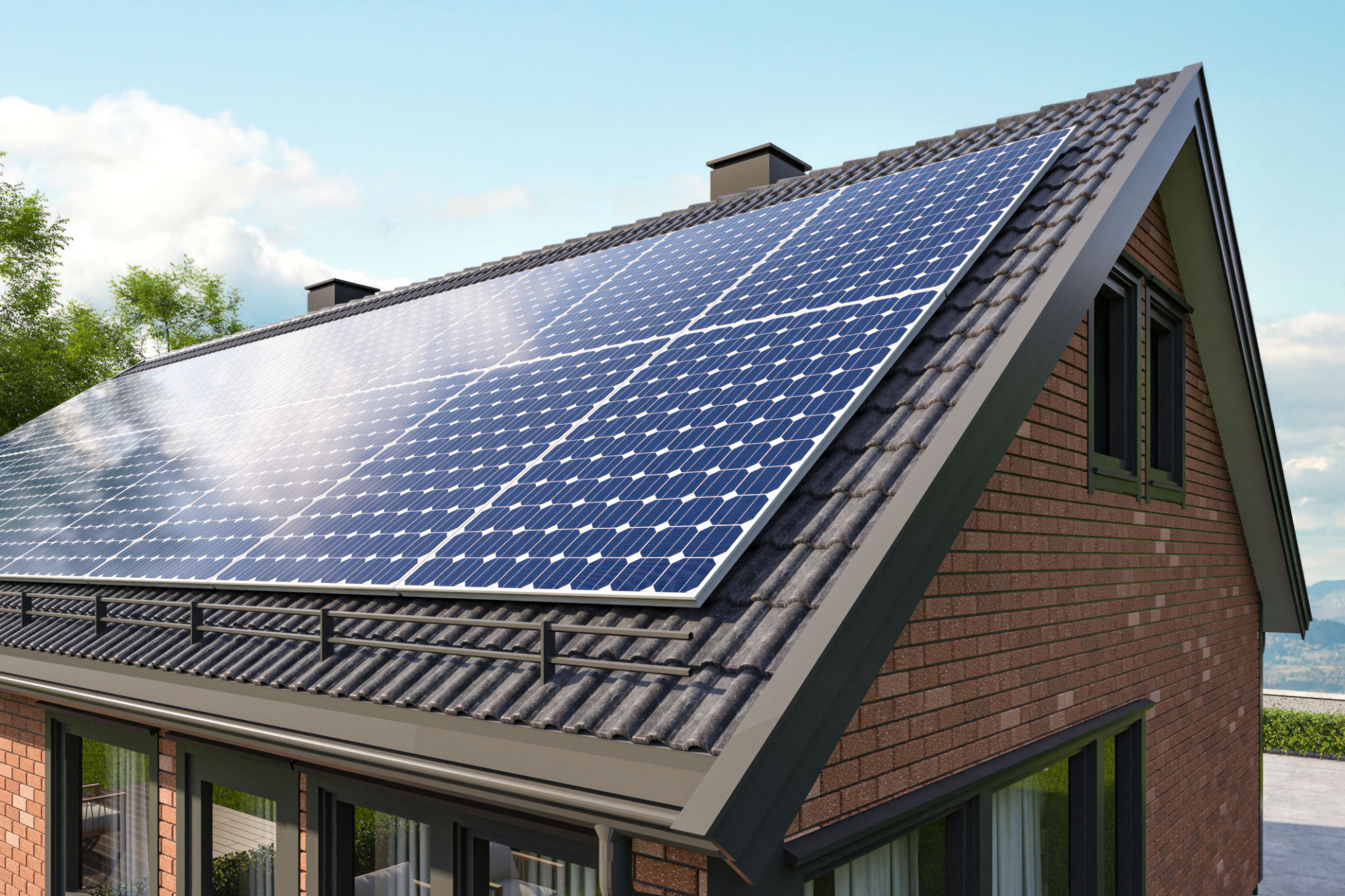Solar Panels on a Roof of Modern Brick House Solar Panels on a Roof of Modern Brick House