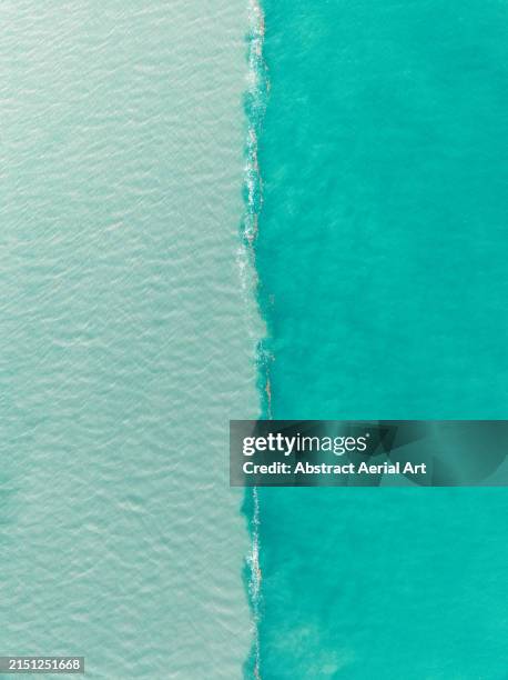 water confluence in willie creek estuary photographed from a drone point of view, broome, western australia, australia - broome australia stock pictures, royalty-free photos & images