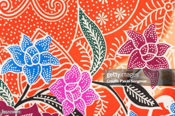 full frame shot of traditional patterned indonesian batik texture. - batik pattern stock pictures, royalty-free photos & images